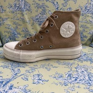Women’s Converse Chuck Taylor All-Star platform high tops.